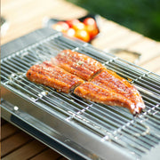 Stylish AMERZIS stainless steel electric grill for indoor and outdoor use, 110-130V American plug with temperature control and removable surface brush, ideal for cooking steaks and vegetables
